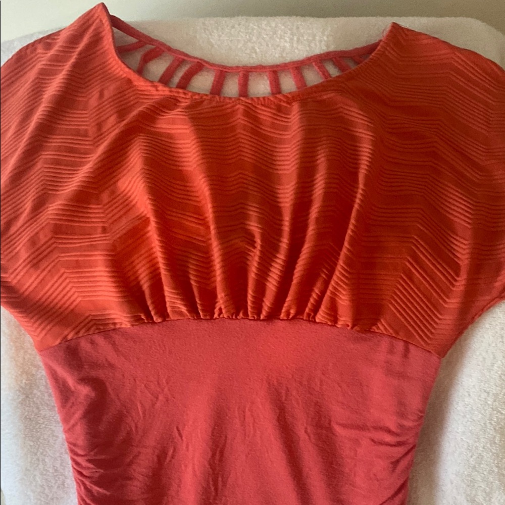 Chic Coral top with Unique Back Accent Neckline